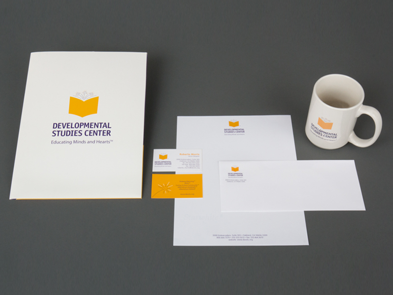 identity package showing pocket folder, letterhead package and mug